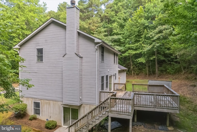 view of home's exterior featuring a deck