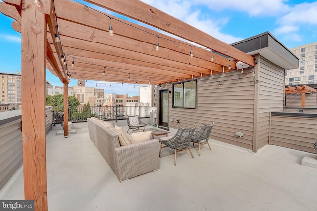 view of patio featuring an outdoor living space and a pergola