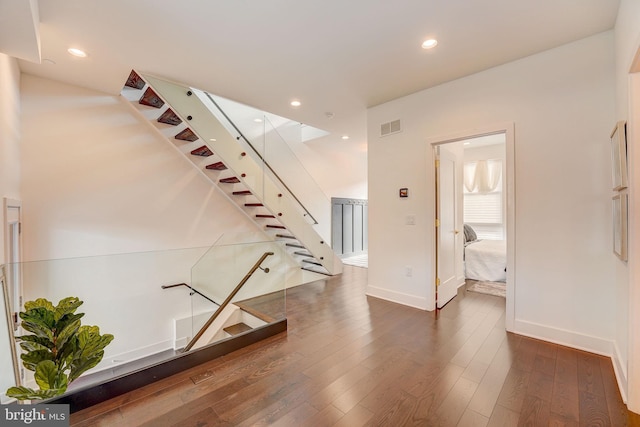 interior space with dark wood-type flooring