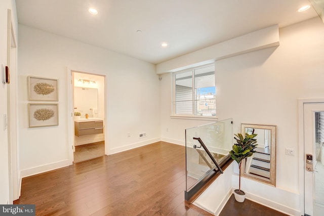 interior space with dark hardwood / wood-style floors