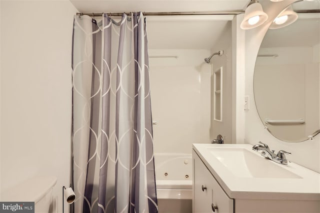 full bathroom featuring shower / tub combo, vanity, and toilet