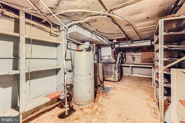 basement with heating unit and water heater