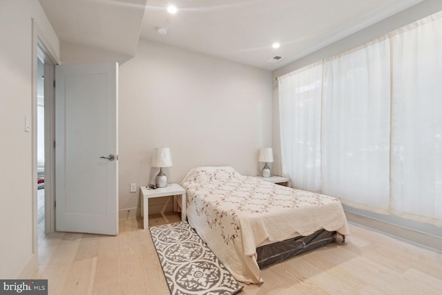 bedroom featuring light hardwood / wood-style flooring