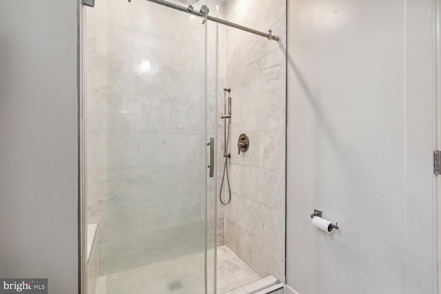 bathroom featuring an enclosed shower