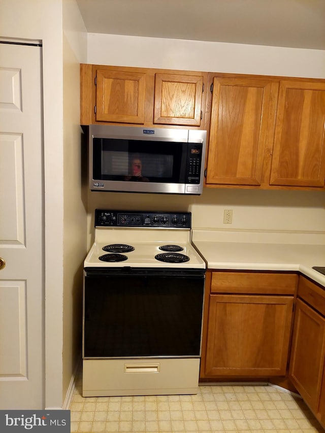 kitchen featuring range with electric stovetop