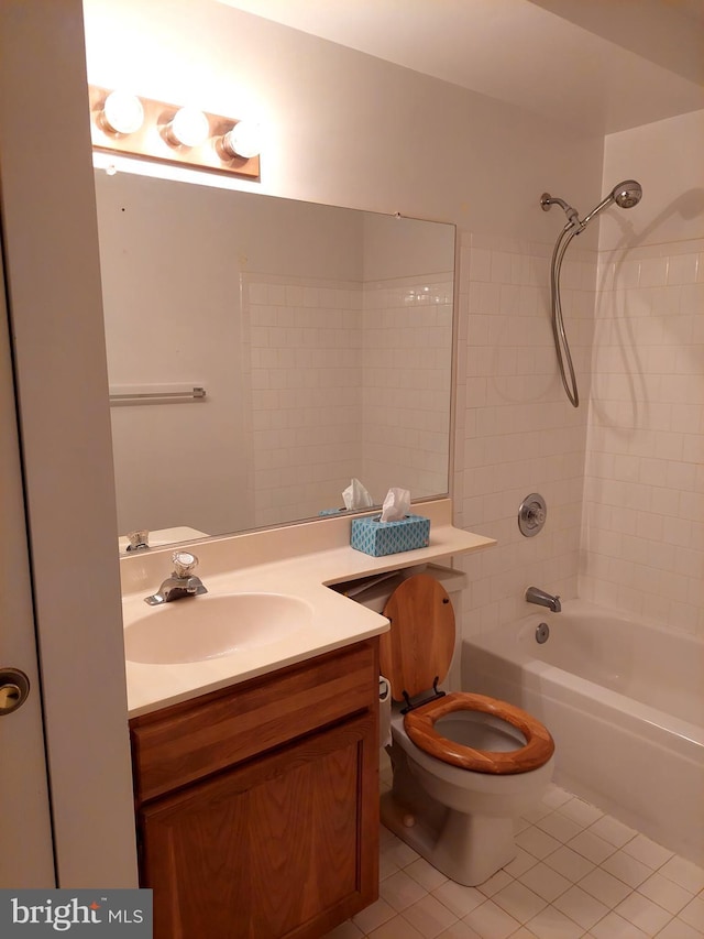 full bathroom with tile patterned flooring, vanity, toilet, and shower / tub combination