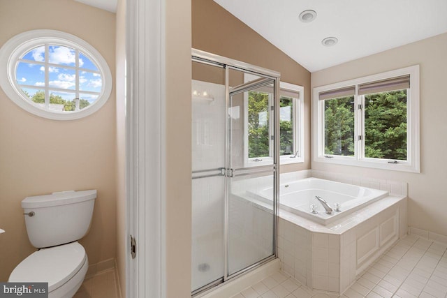 bathroom with lofted ceiling, toilet, independent shower and bath, and tile patterned flooring