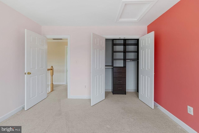 unfurnished bedroom featuring light colored carpet