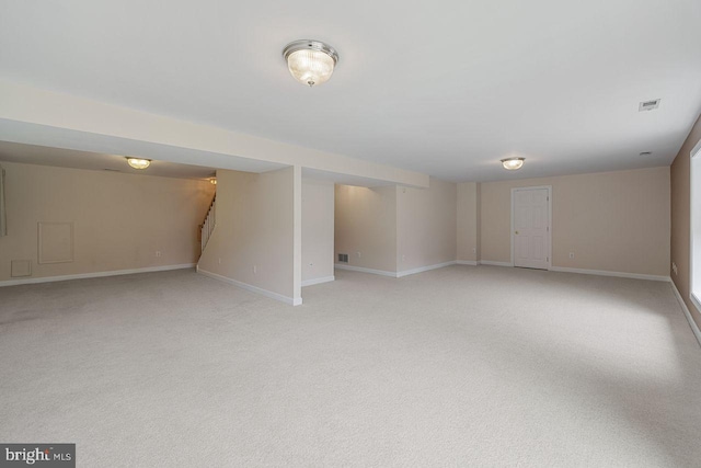 basement with light colored carpet