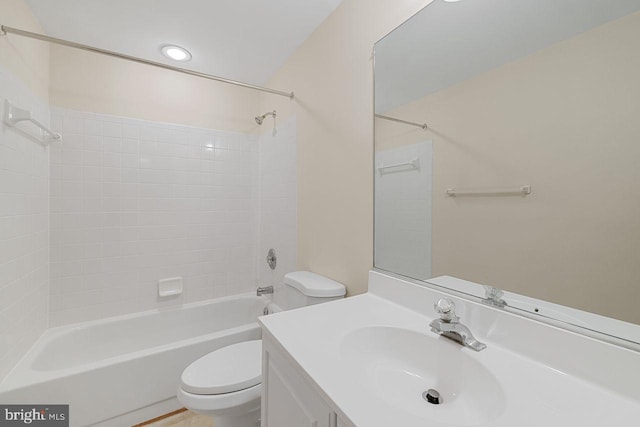 full bathroom featuring vanity, toilet, and shower / bath combination