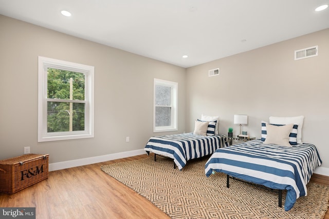 bedroom featuring light hardwood / wood-style floors