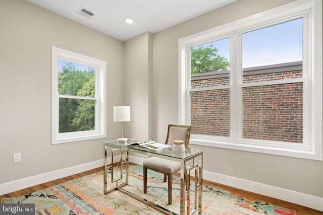 home office featuring hardwood / wood-style flooring