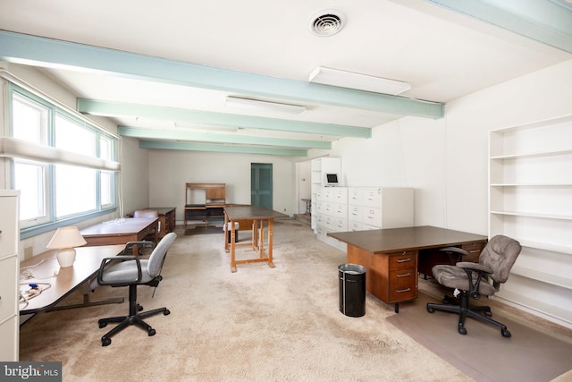 office with beam ceiling and light carpet