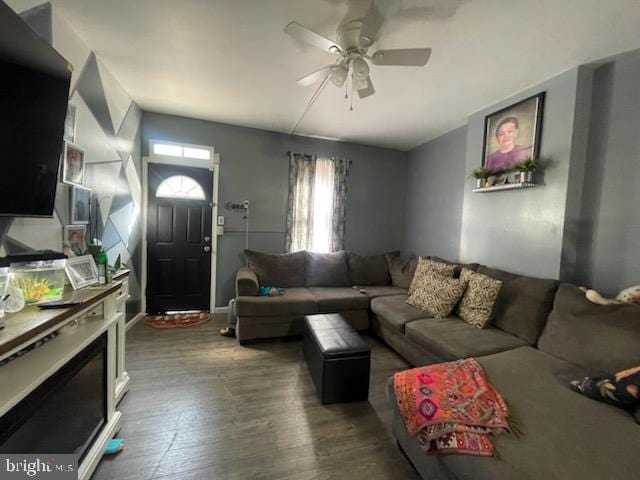 living room with ceiling fan