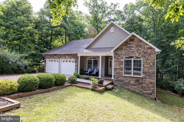 view of front facade featuring a garage and a front lawn