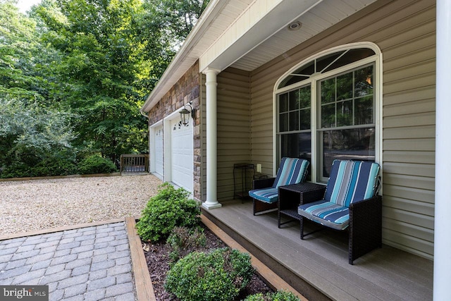 view of patio / terrace with a garage