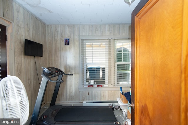 workout area with wood walls