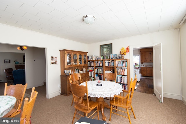 view of carpeted dining space