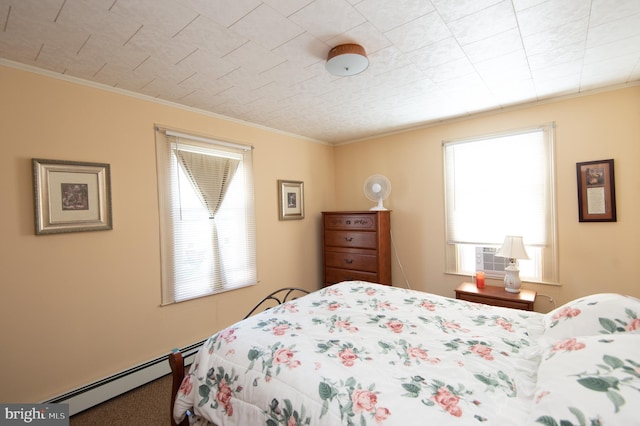 bedroom with multiple windows, carpet floors, baseboard heating, and ornamental molding