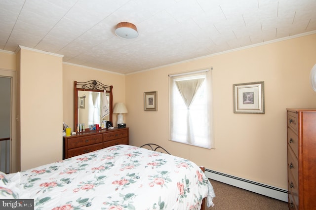 carpeted bedroom with crown molding and a baseboard heating unit