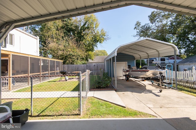 view of car parking featuring a carport and a lawn