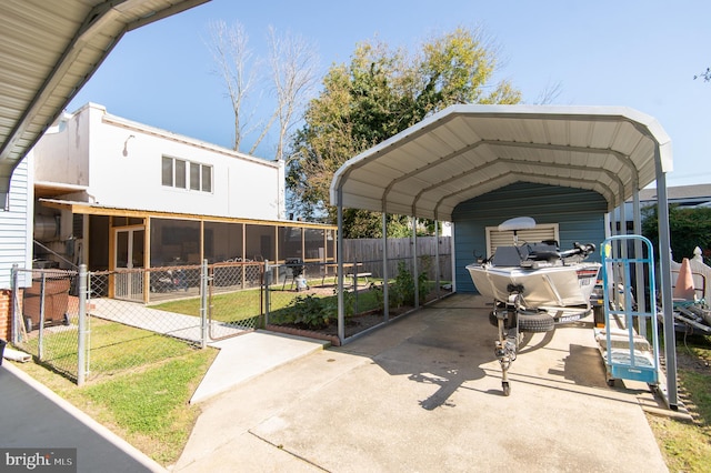 view of parking / parking lot featuring a carport