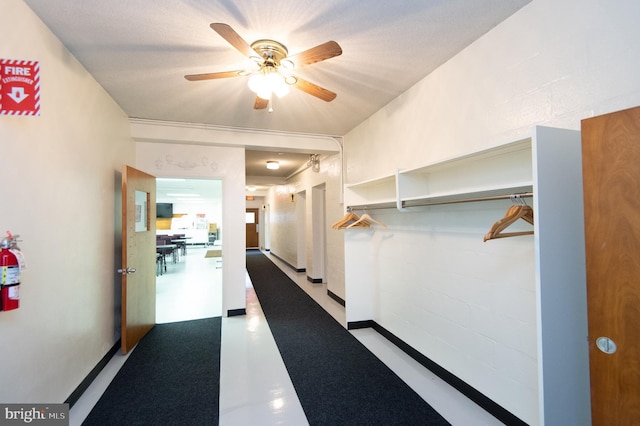 hallway featuring concrete floors