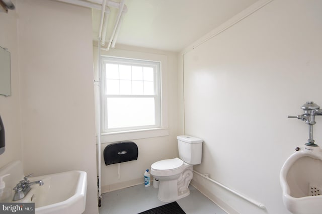 bathroom featuring toilet and sink