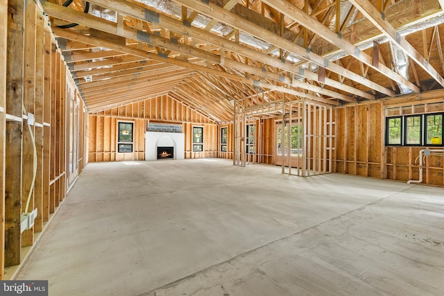 miscellaneous room featuring a fireplace and plenty of natural light