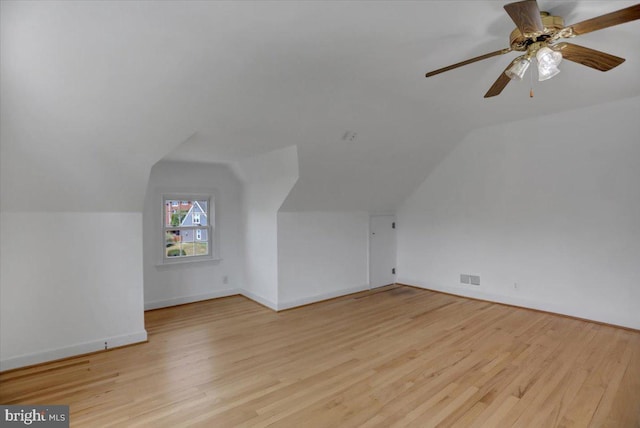 bonus room featuring ceiling fan, light hardwood / wood-style flooring, and lofted ceiling