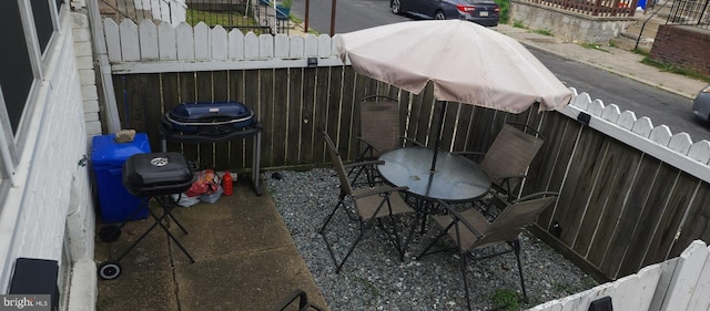 view of patio / terrace featuring a grill