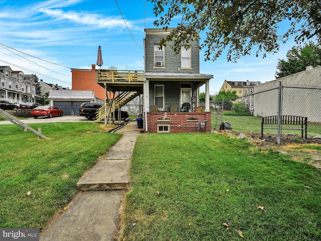 exterior space featuring a garage and a front lawn