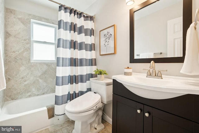 full bathroom featuring vanity, toilet, and shower / tub combo