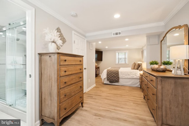 bedroom featuring light hardwood / wood-style flooring and ornamental molding