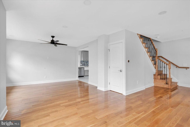 unfurnished living room with light hardwood / wood-style flooring and ceiling fan