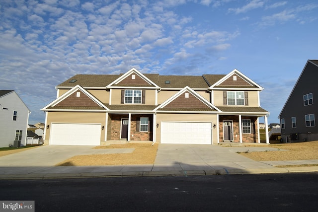 craftsman inspired home with a garage