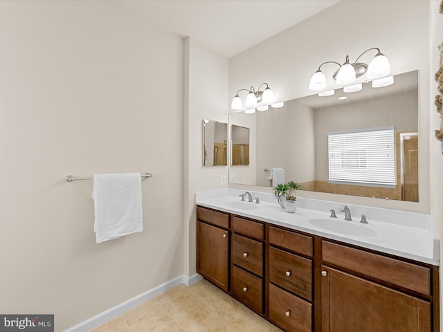 bathroom featuring tile patterned flooring and vanity