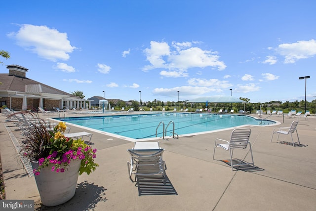 view of pool with a patio