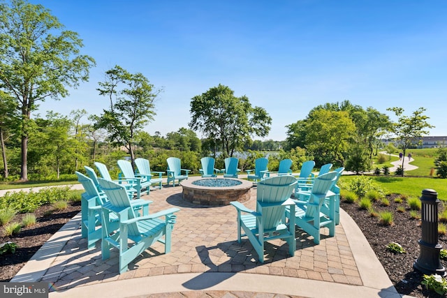 view of patio / terrace featuring a fire pit