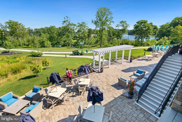 view of patio featuring a pergola, a water view, and an outdoor hangout area