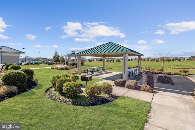 exterior space with a gazebo and a yard