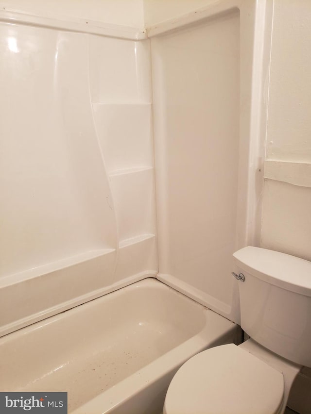 bathroom with  shower combination and toilet