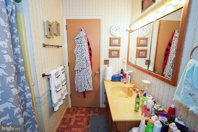 bathroom featuring vanity and parquet floors