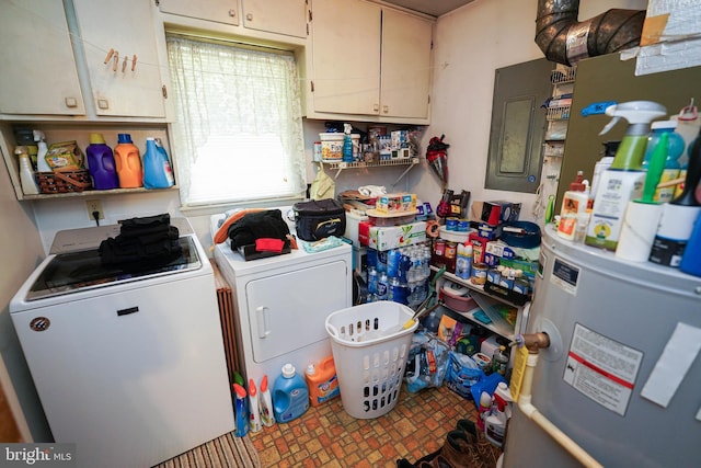 laundry room featuring cabinets and washing machine and clothes dryer