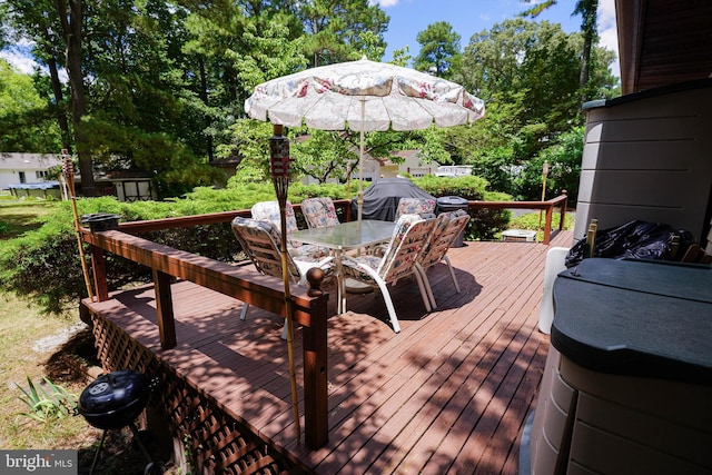 wooden deck with a storage unit