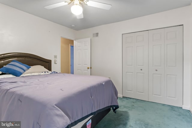 carpeted bedroom with ceiling fan and a closet