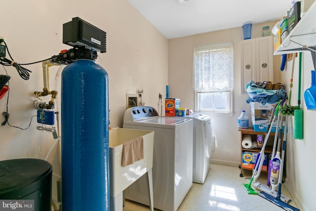 washroom with washer and dryer