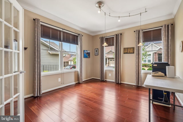 interior space featuring crown molding and dark wood-type flooring