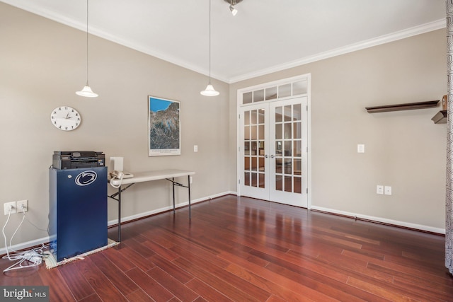 unfurnished dining area featuring french doors, dark wood-type flooring, and crown molding