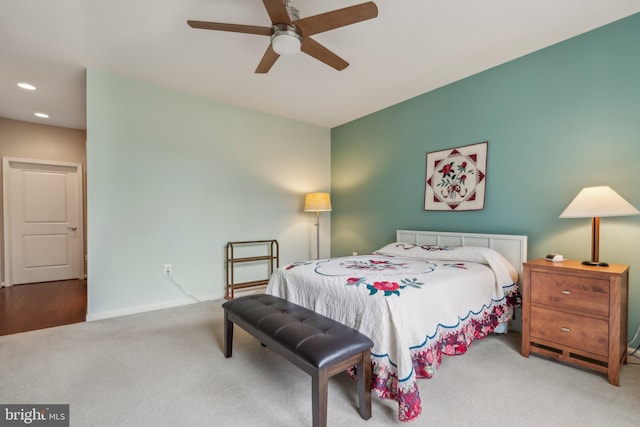 bedroom featuring ceiling fan and carpet floors